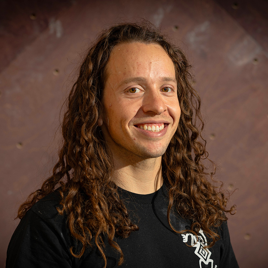 Devon, Sr. Routesetter & Competition Team Coach​ at Sessions Climbing & Fitness